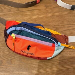 Cotopaxi Colorful Belt Bag with Red and Blue Accents